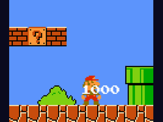 Super Mario Bros screenshot - Fire Mario throwing fireballs at Koopa Troopas