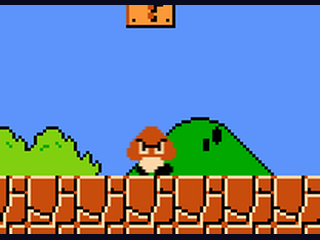 Super Mario Bros gameplay screenshot - Mario jumping over pipes in World 1-1